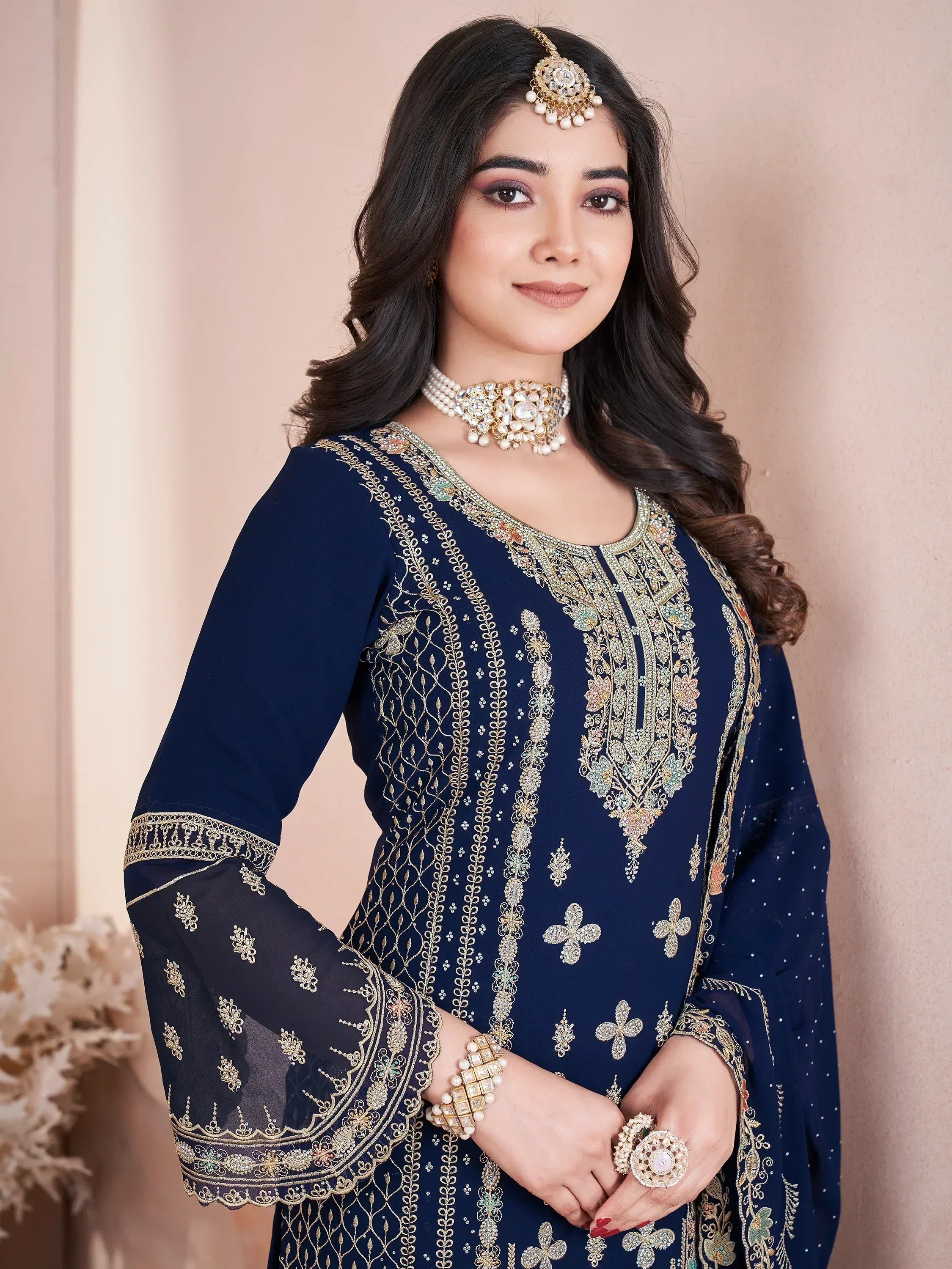 Navy blue embroidered ethnic kurti with gold detailing, perfect for Indian festive wear and occasions.