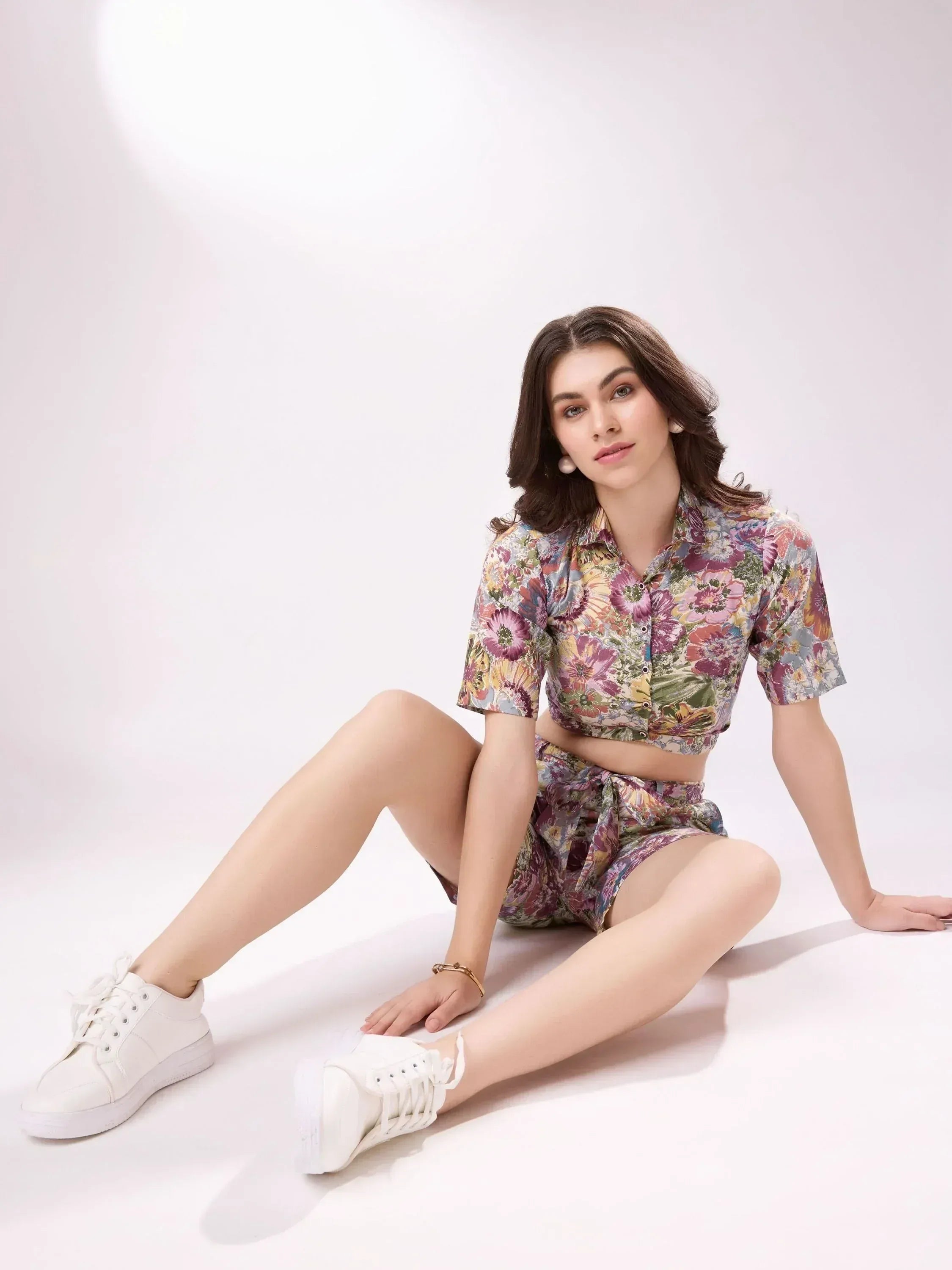 Floral print crop top and shorts set with white sneakers, stylish ethnic wear for women