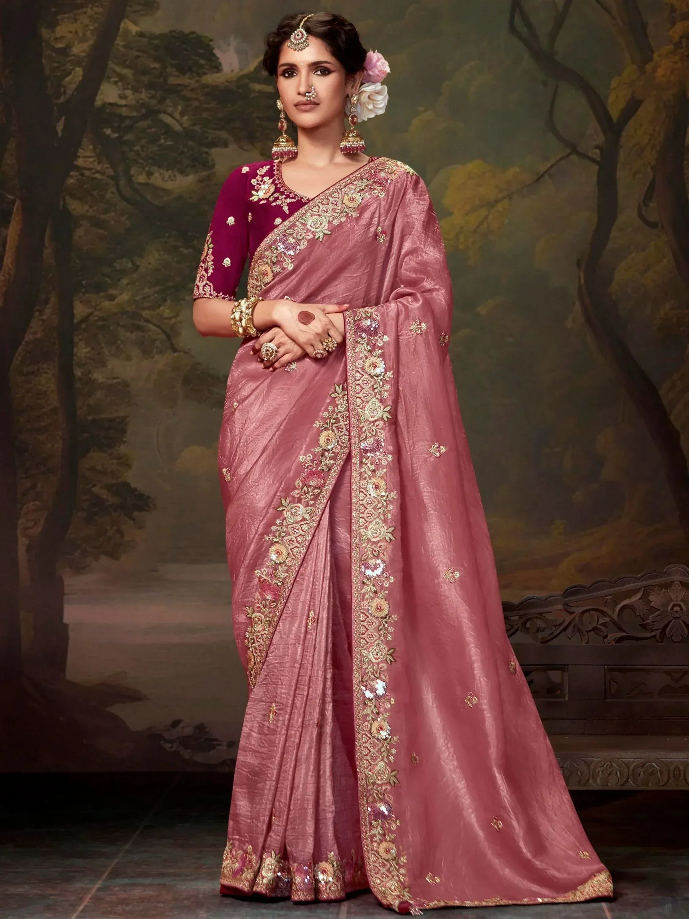 Pink embroidered saree with floral gold detailing, perfect for Indian ethnic wear events