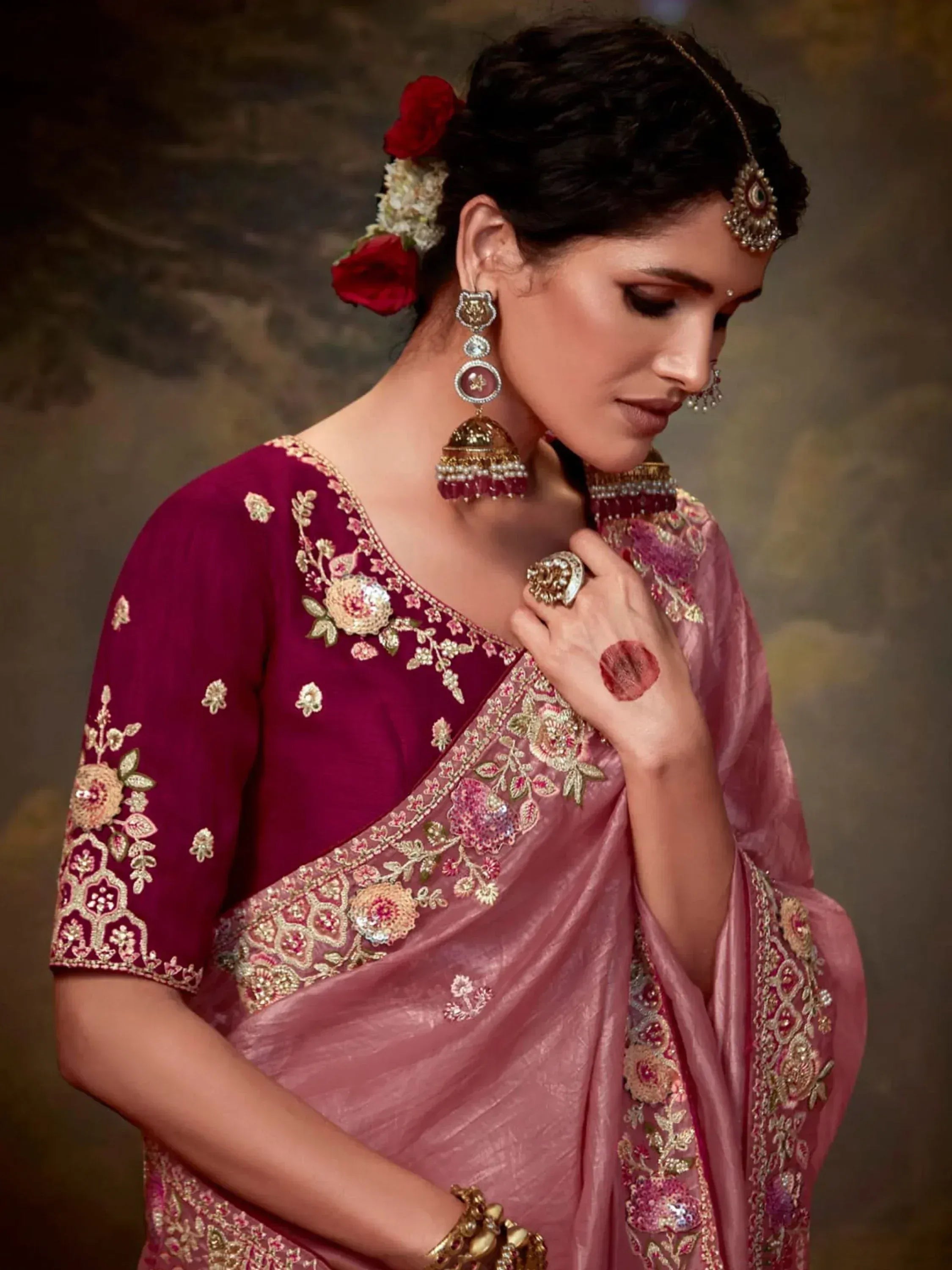 Elegant Indian saree with floral embroidery, perfect for weddings and festive occasions.
