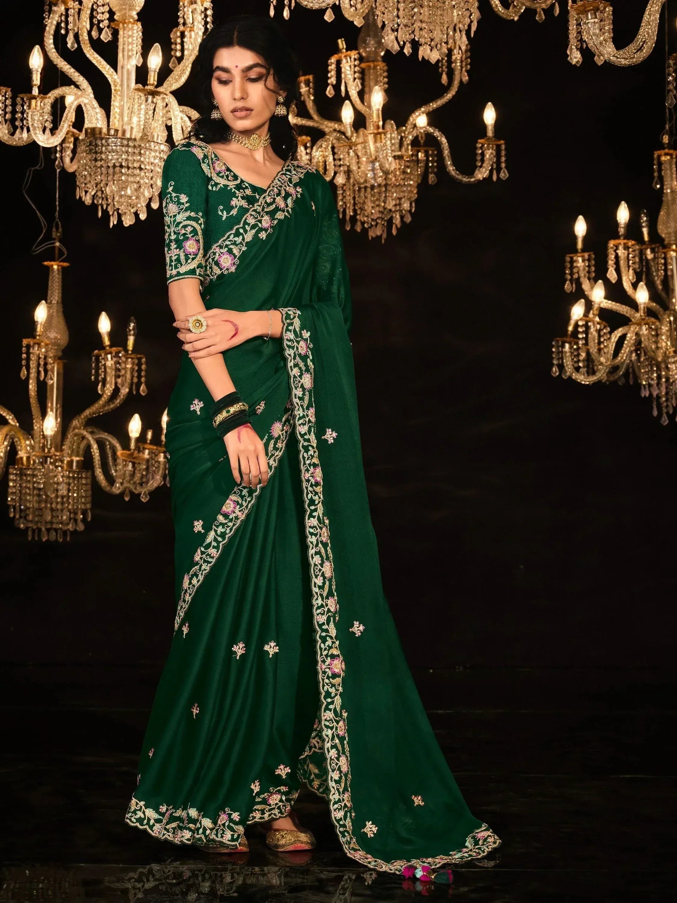 Emerald green embroidered saree with floral detailing, perfect for Indian ethnic occasions