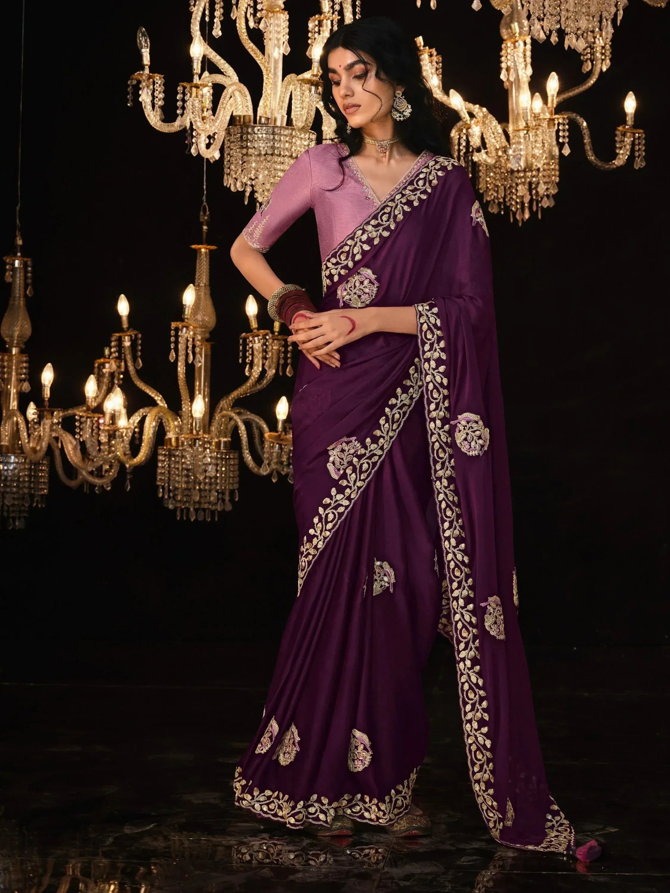 Elegant purple saree with gold embroidery, perfect for Indian ethnic wear and festive occasions.