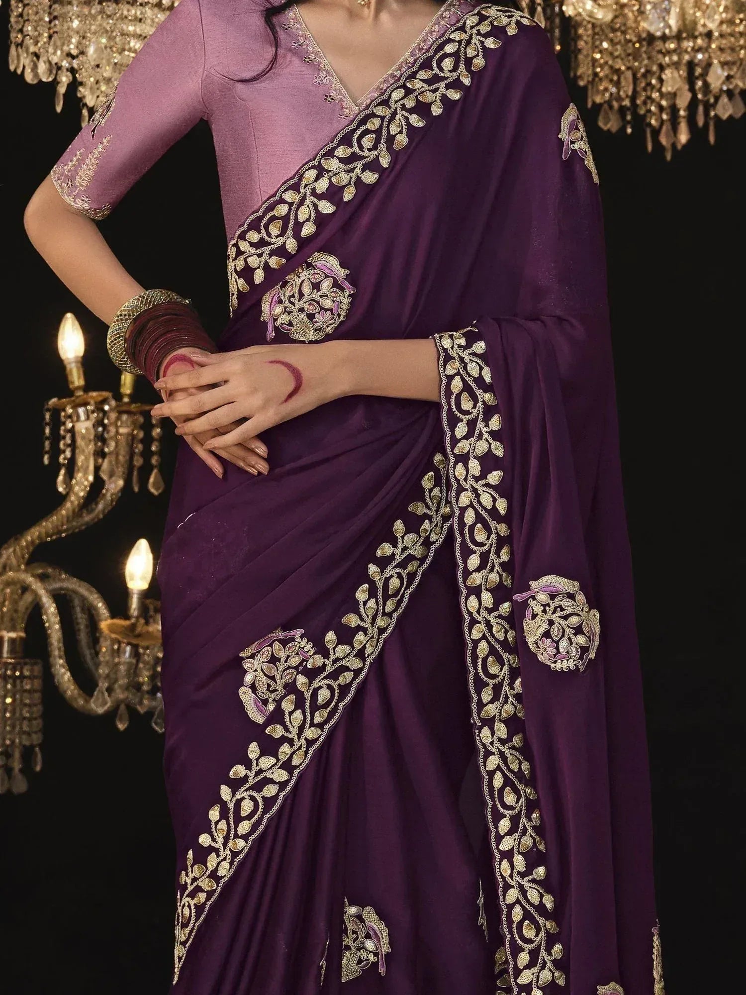 Purple embroidered saree with gold leaf detailing, perfect for Indian ethnic wear occasions.