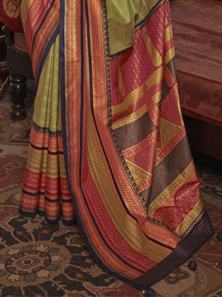 Stunning Olive Green Zari Weaving Silk Function Wear Saree With Blouse