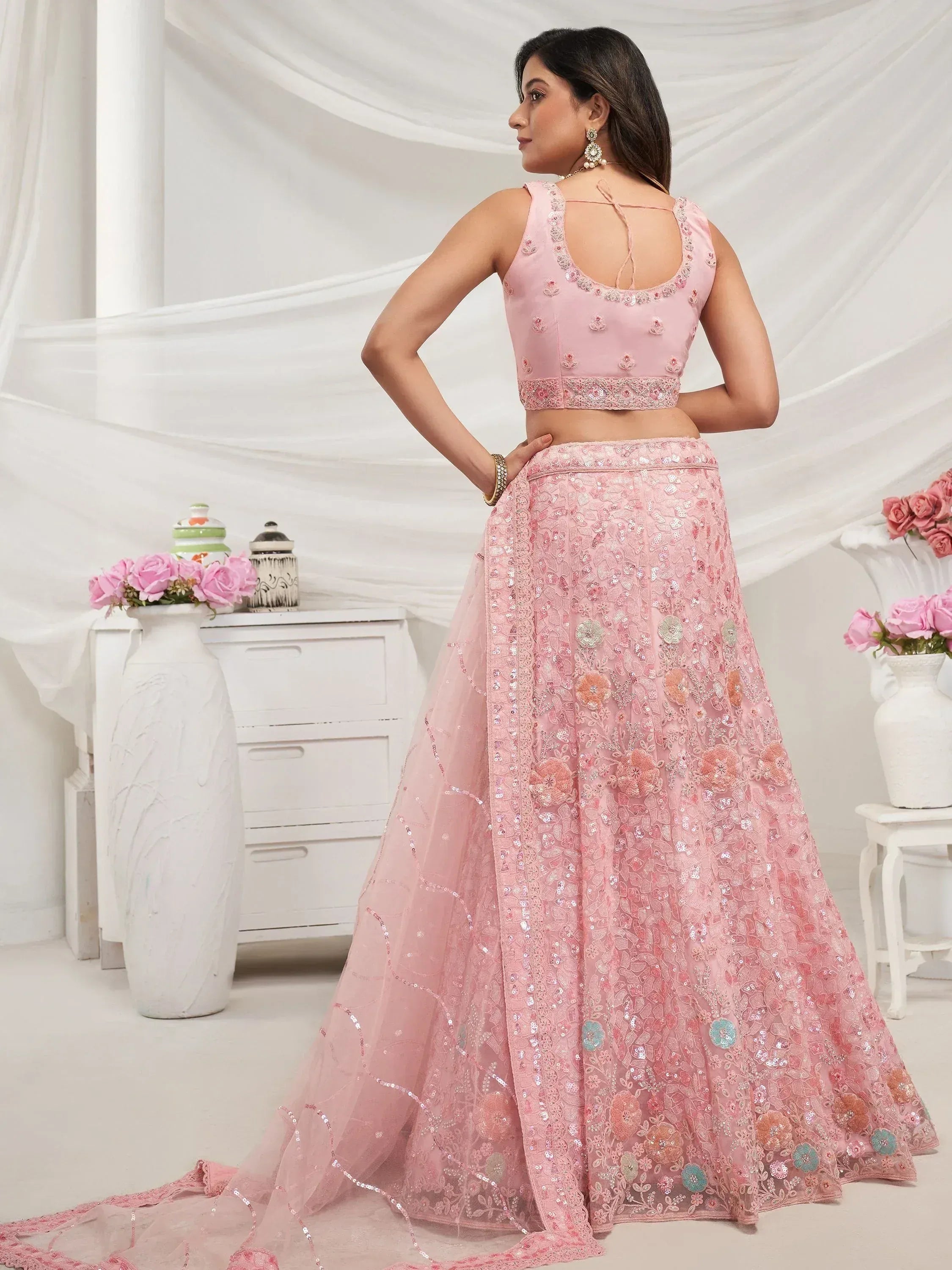 Pink floral embroidered lehenga choli with sequin detailing, perfect for Indian ethnic wear