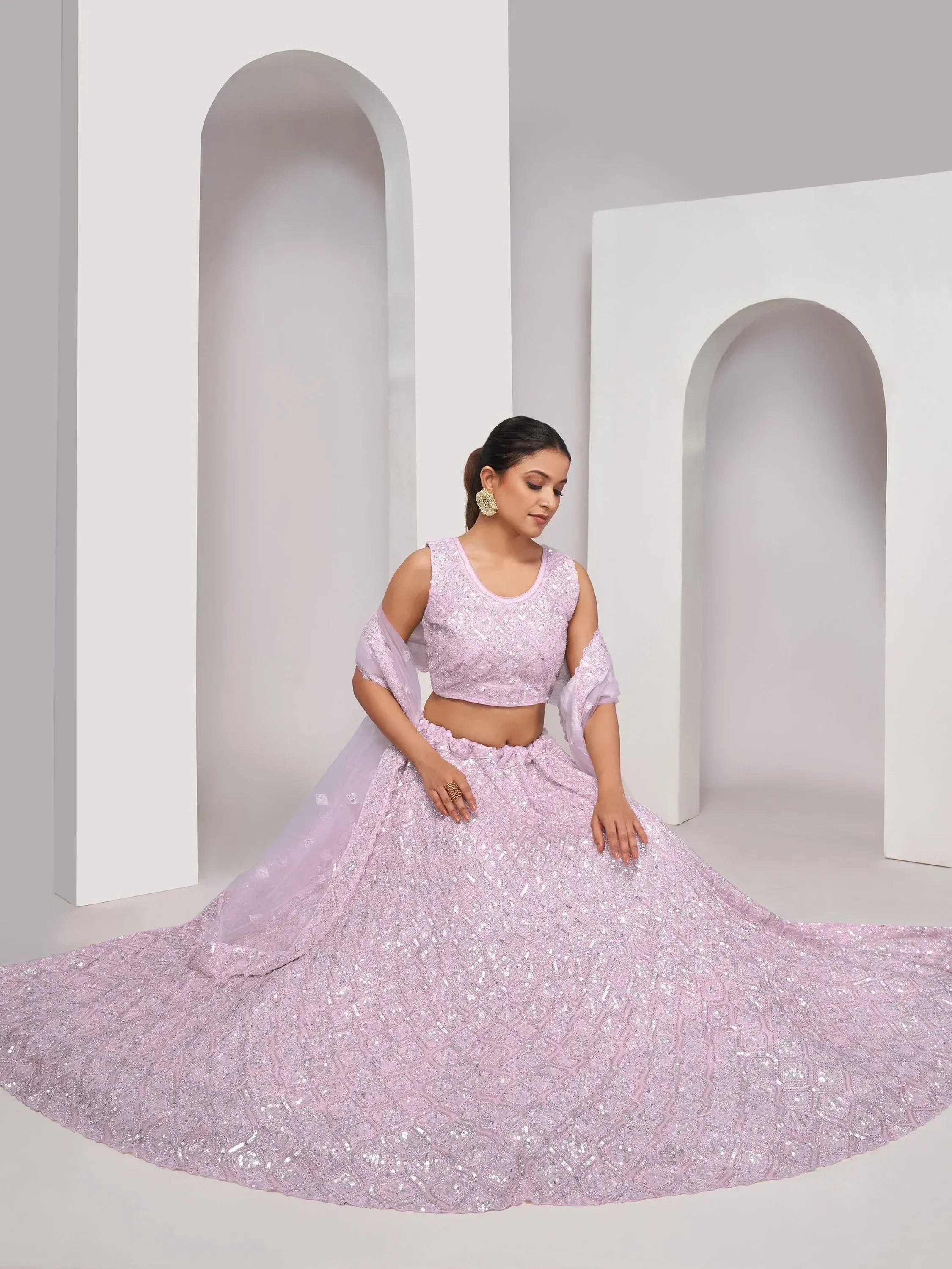 Elegant lavender lehenga choli with intricate sequin work, perfect for Indian ethnic wear