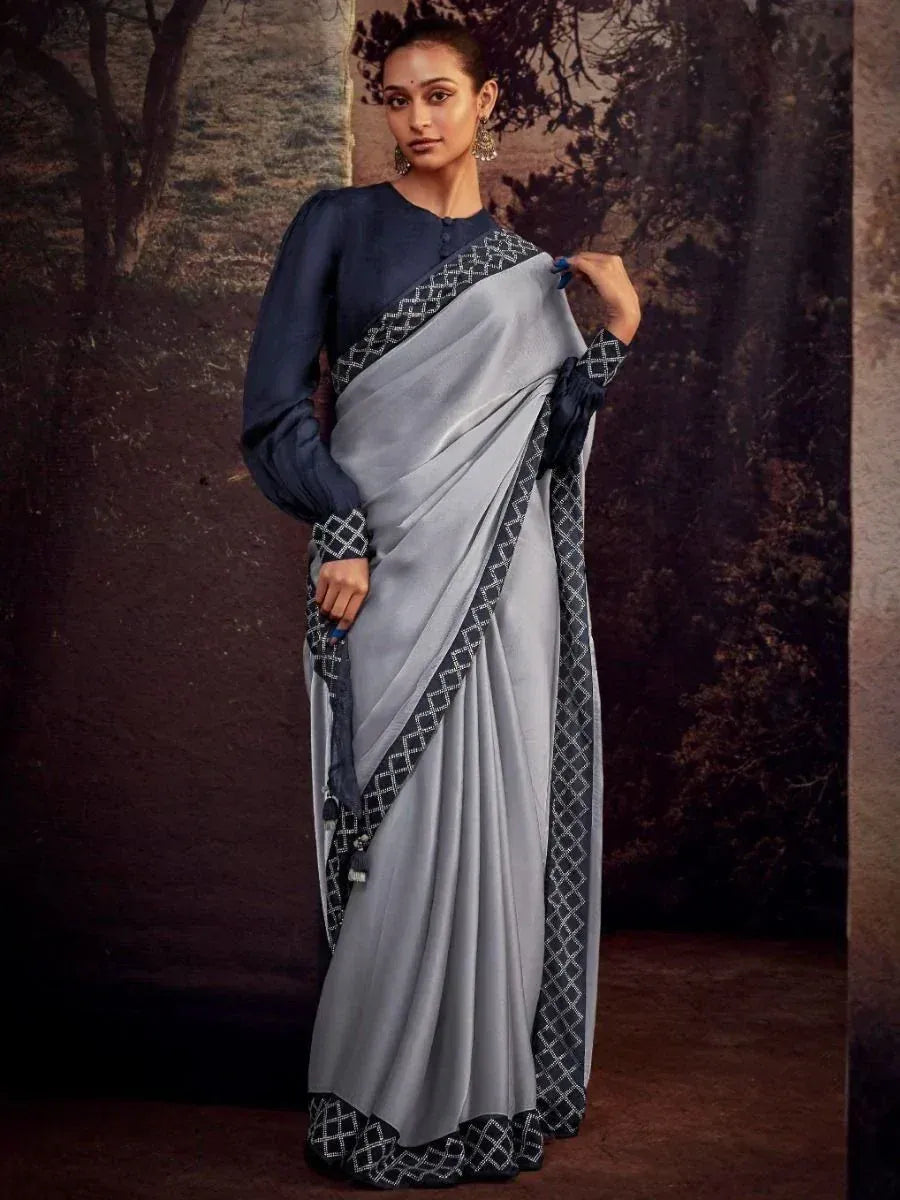 Grey saree with navy blue geometric border and matching blouse, elegant Indian ethnic wear