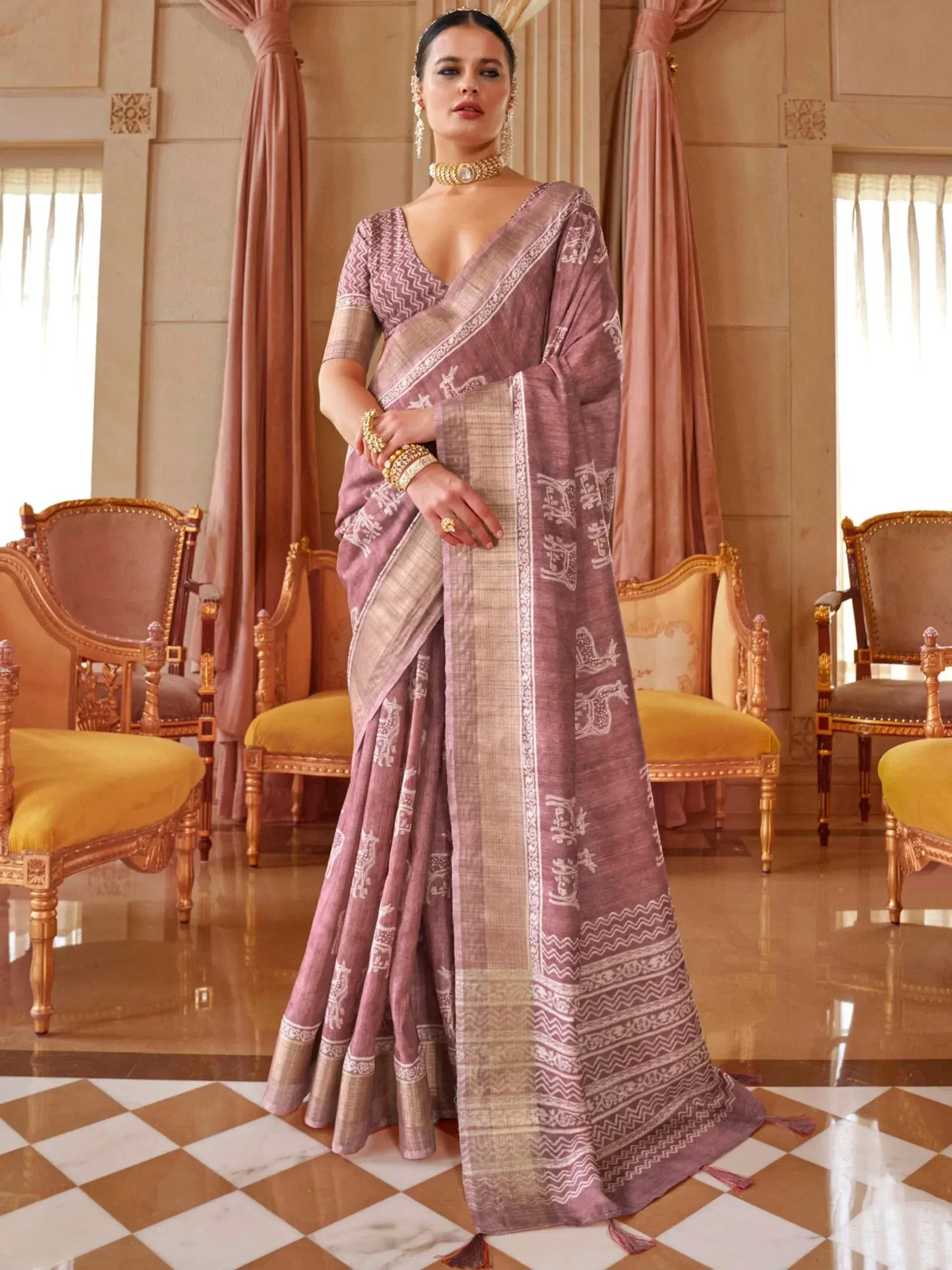 Elegant mauve saree with white block print and gold border, paired with matching blouse, perfect for Indian ethnic occasions.