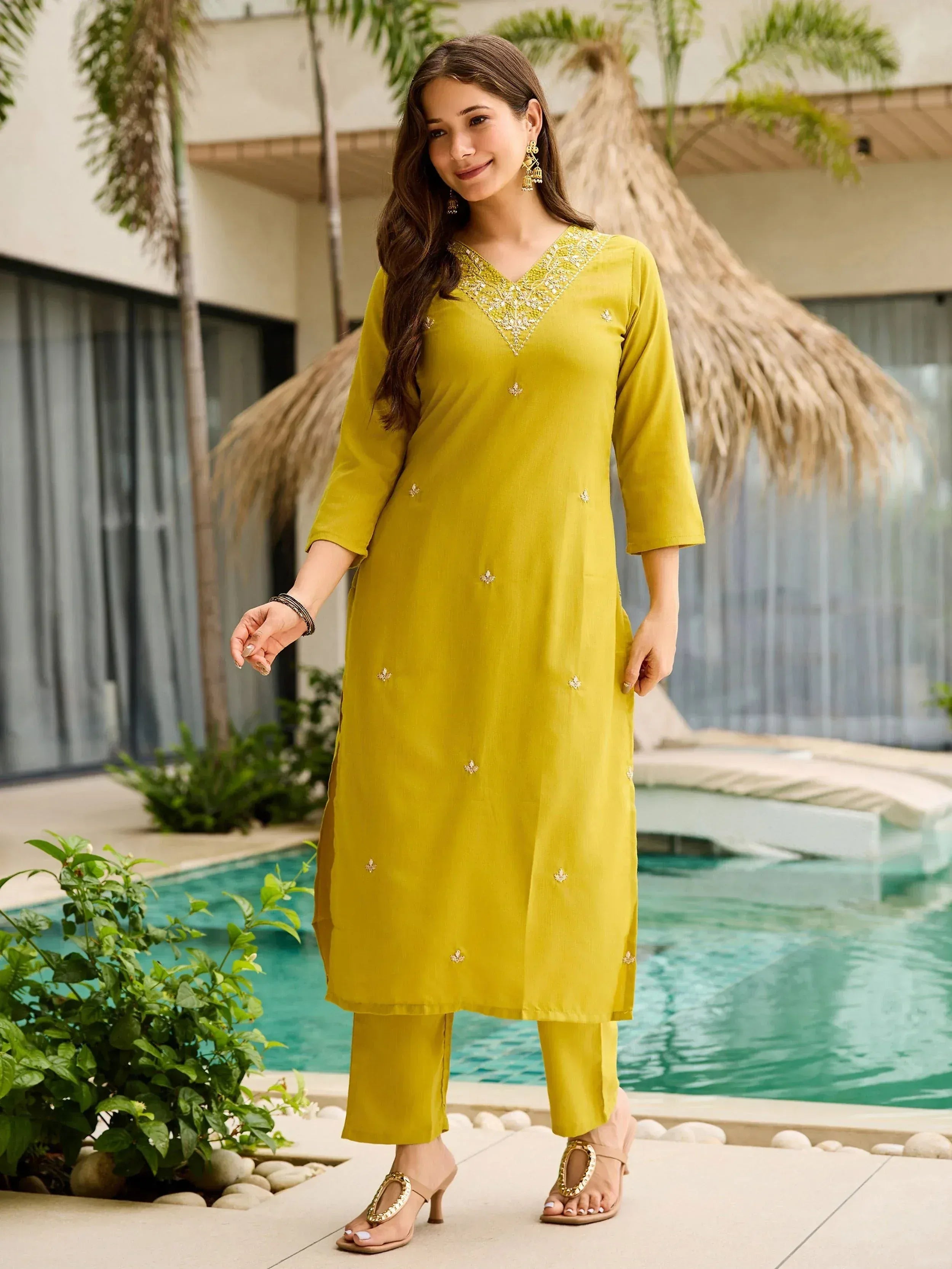 Yellow embroidered kurta set with palazzo pants, perfect for Indian ethnic wear occasions