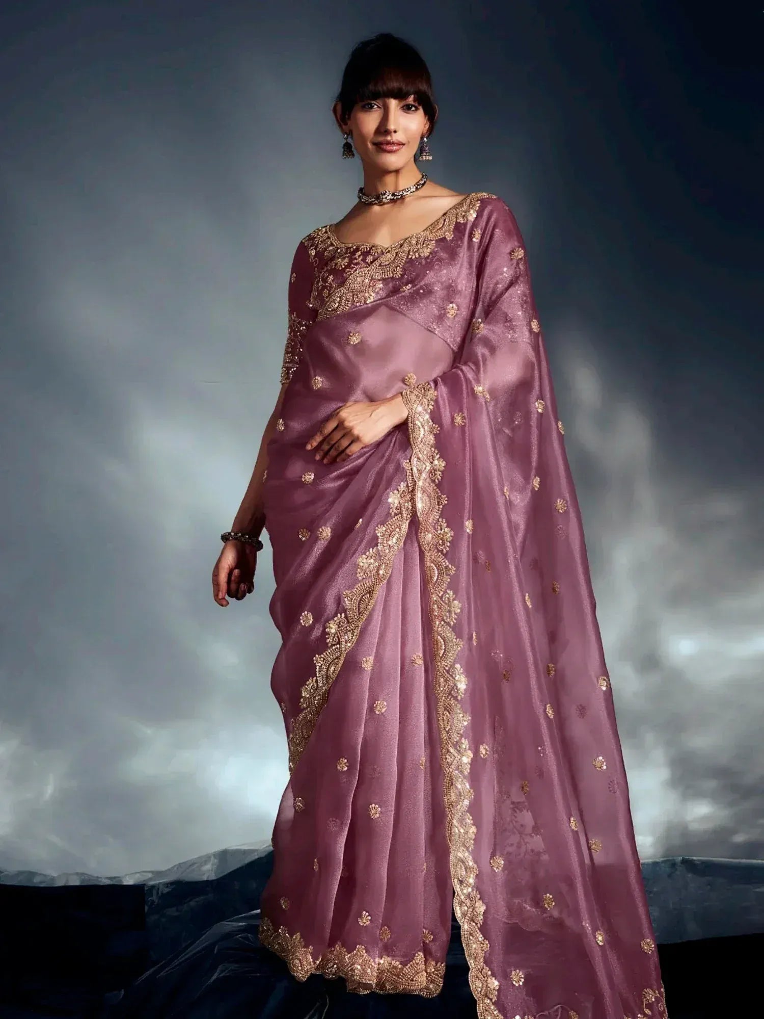 Elegant mauve saree with gold embroidery, perfect for Indian ethnic occasions and weddings.