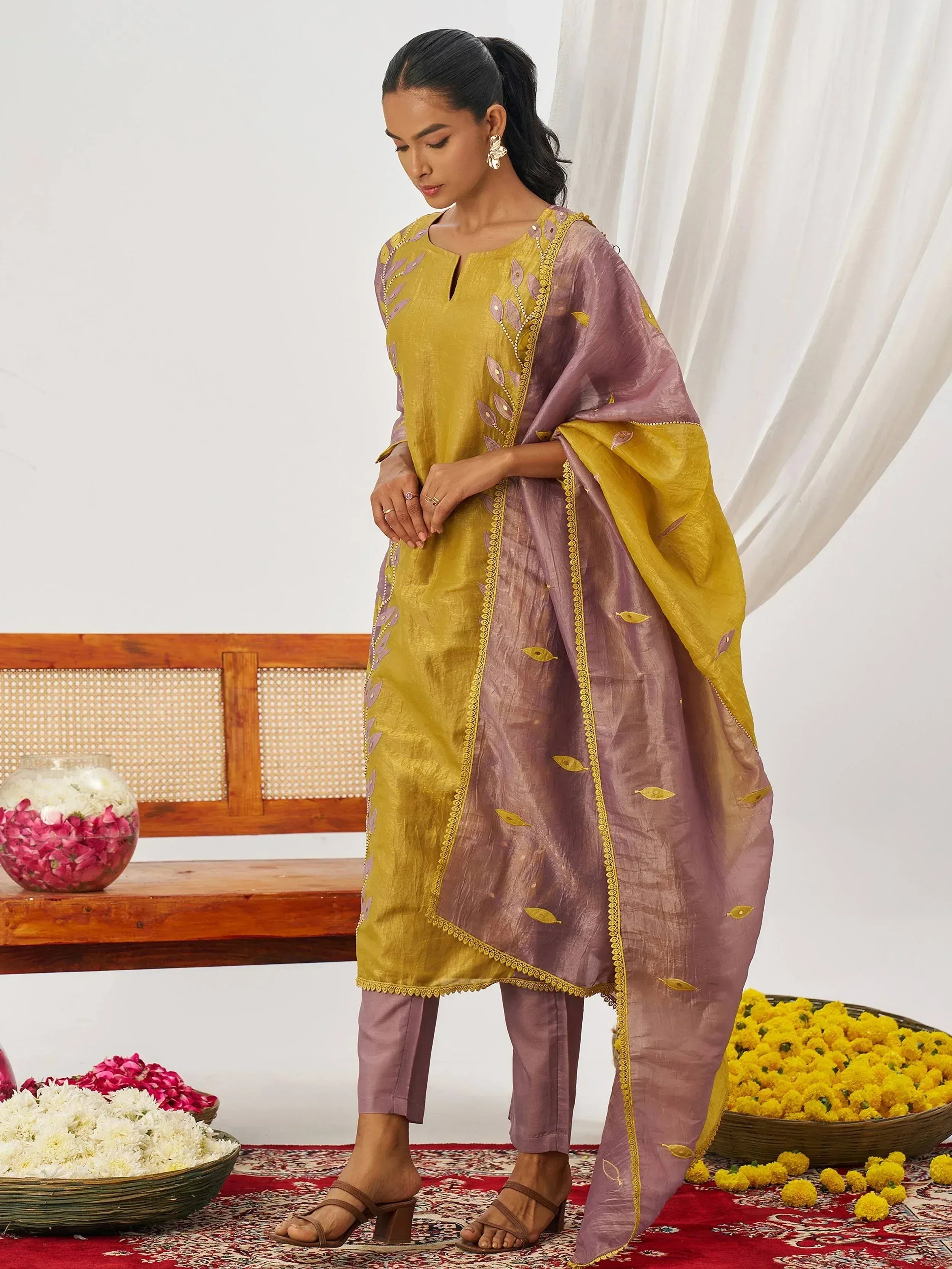 Yellow and mauve embroidered salwar kameez with leaf motifs, perfect for Indian ethnic wear occasions