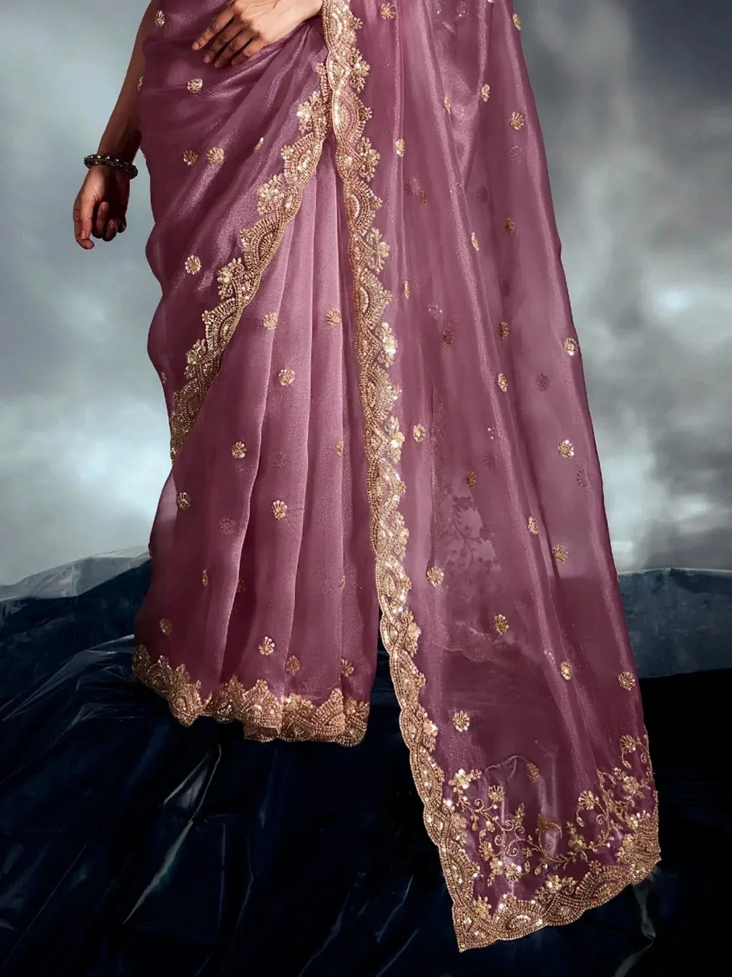 Elegant mauve saree with gold embroidery, perfect for Indian ethnic wear occasions