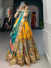 Impressive Yellow Kalamkari Printed Dola Silk Traditional Lehenga Choli
