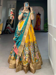 Impressive Yellow Kalamkari Printed Dola Silk Traditional Lehenga Choli