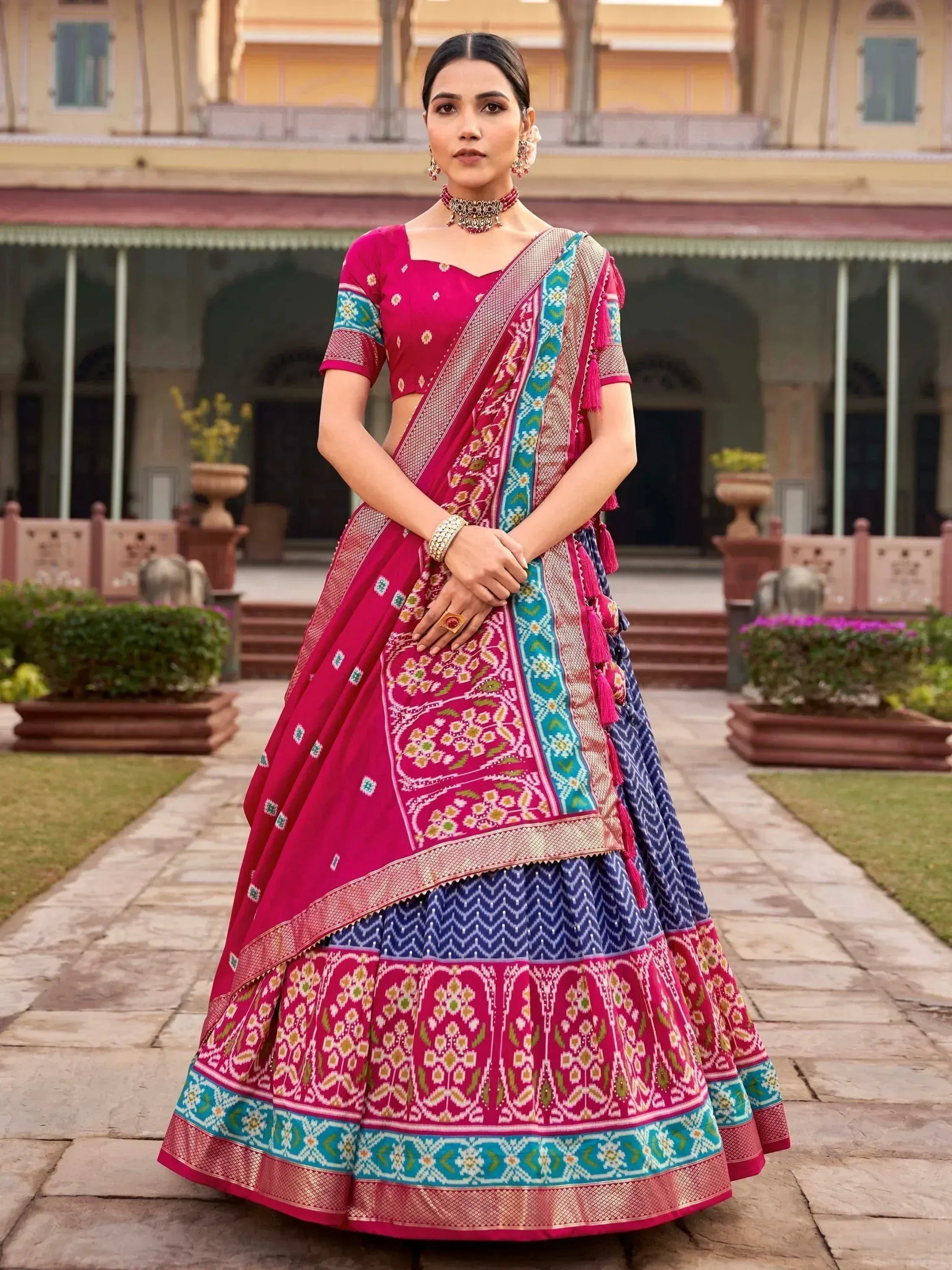 Pink and blue designer lehenga choli with intricate embroidery, perfect for Indian ethnic wear occasions