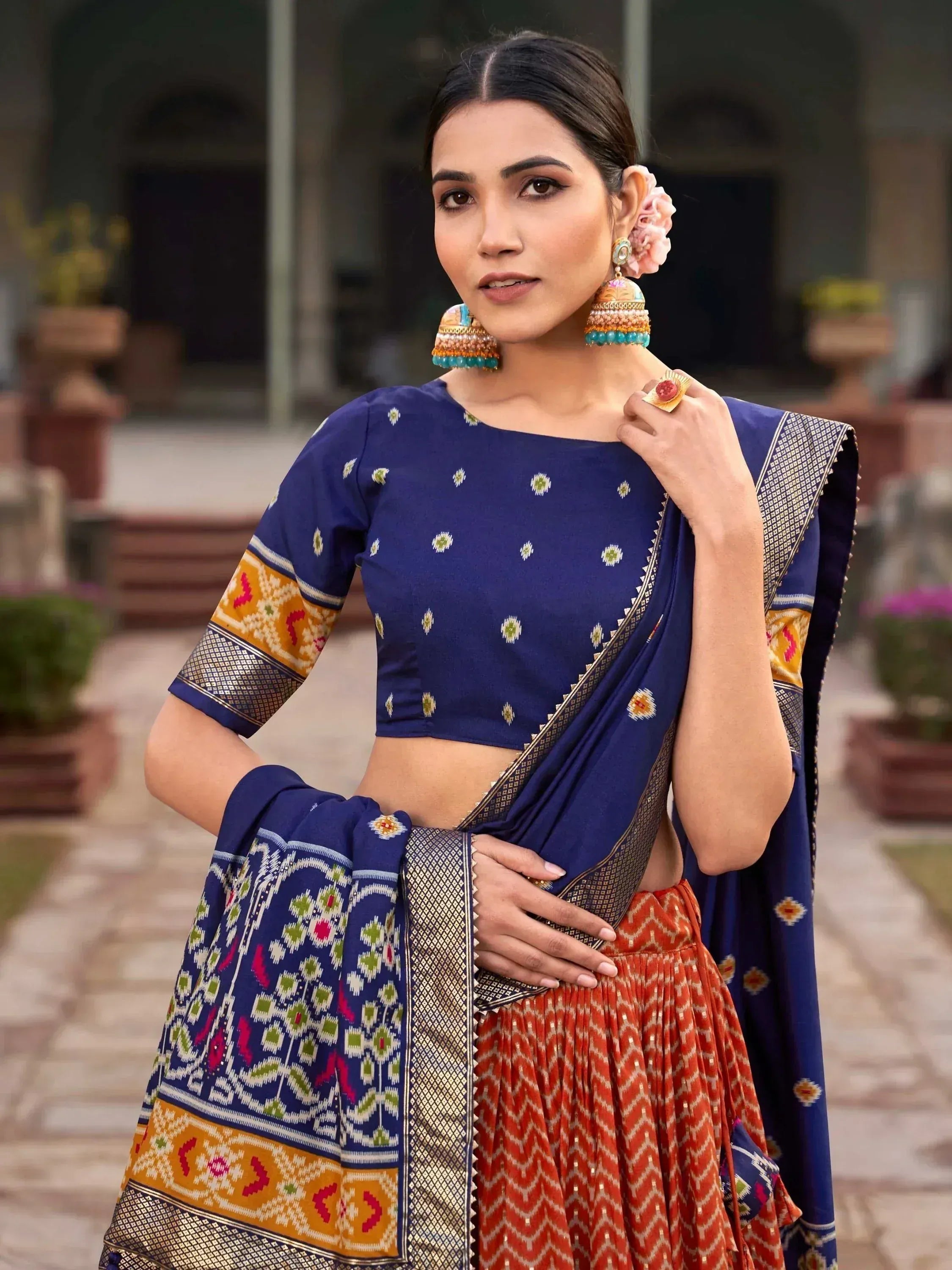 Blue and orange ethnic lehenga choli with printed dupatta, perfect for Indian weddings and festivals