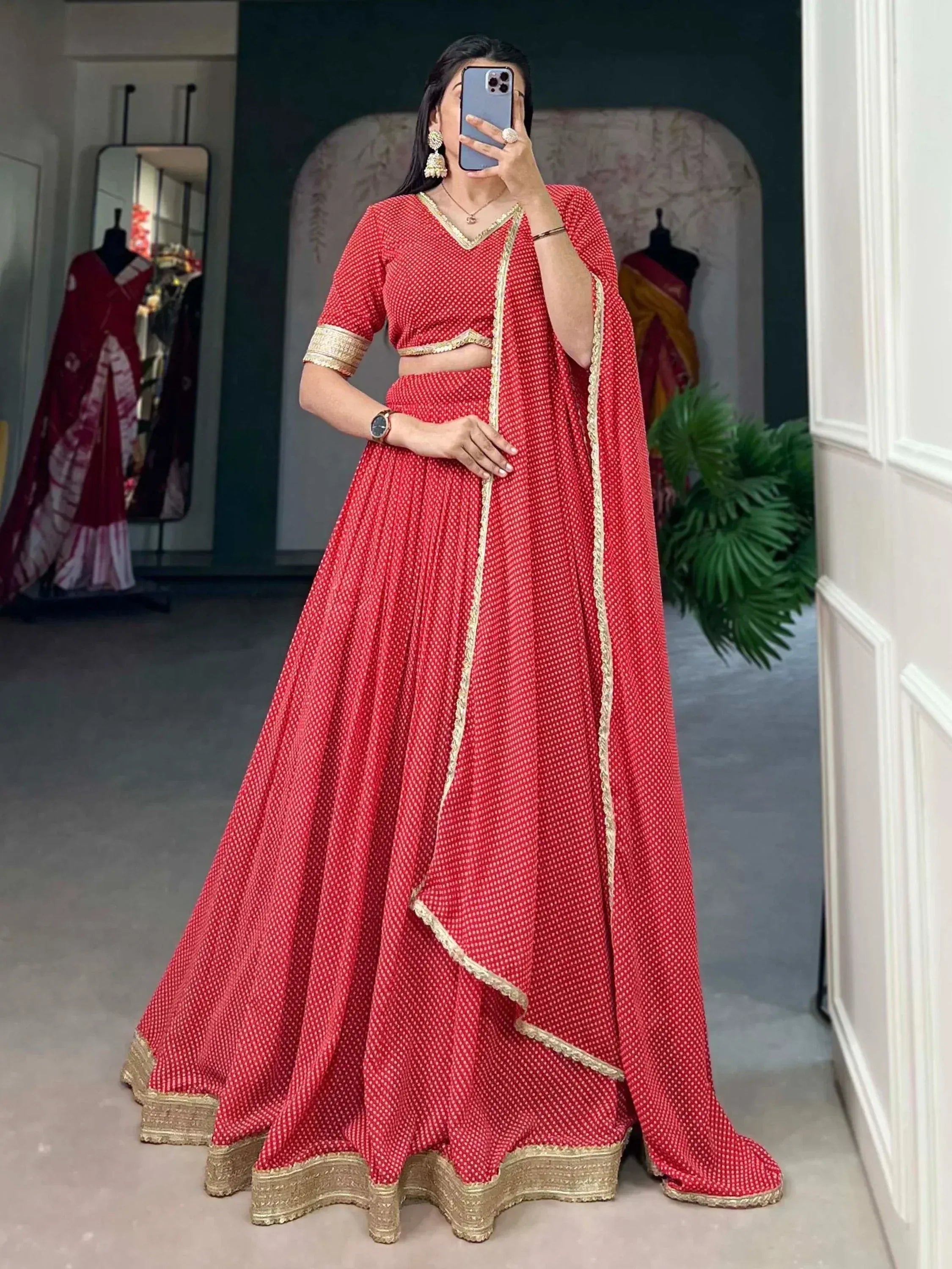 Red printed lehenga choli with gold trim, Indian ethnic wear for women