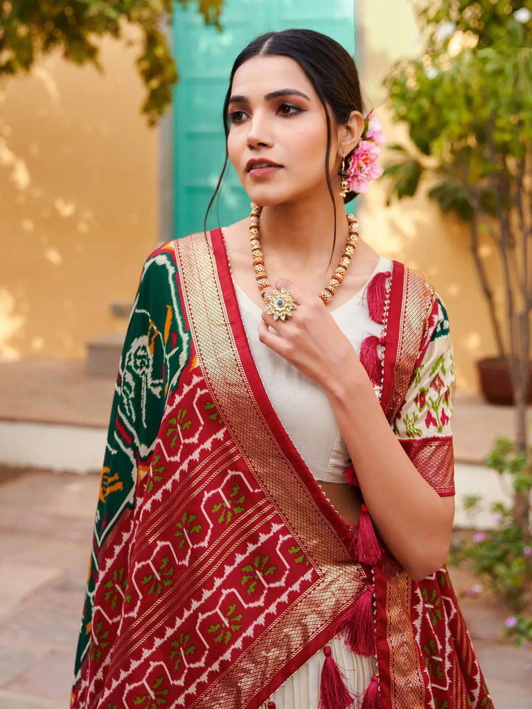 Stunning White & Green Patola Printed Silk Traditional Lehenga Choli