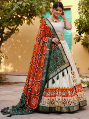 Charming White & Orange Patola Printed Silk Lehenga Choli With Dupatta