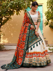 Charming White & Orange Patola Printed Silk Lehenga Choli With Dupatta
