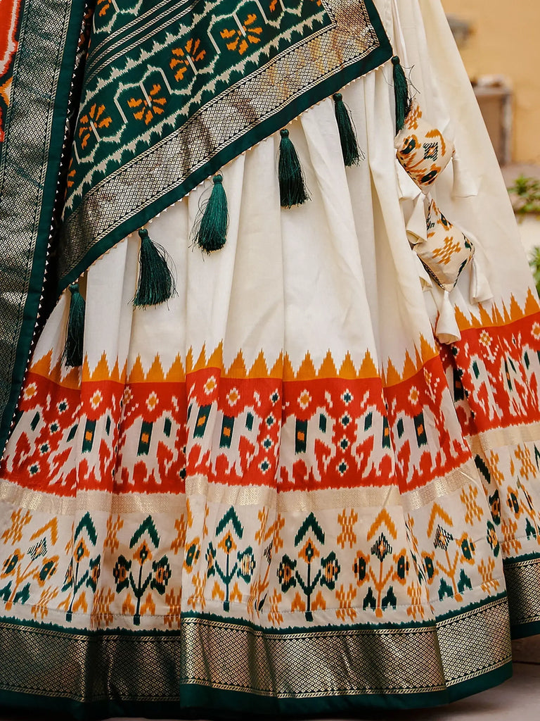 Charming White & Orange Patola Printed Silk Lehenga Choli With Dupatta