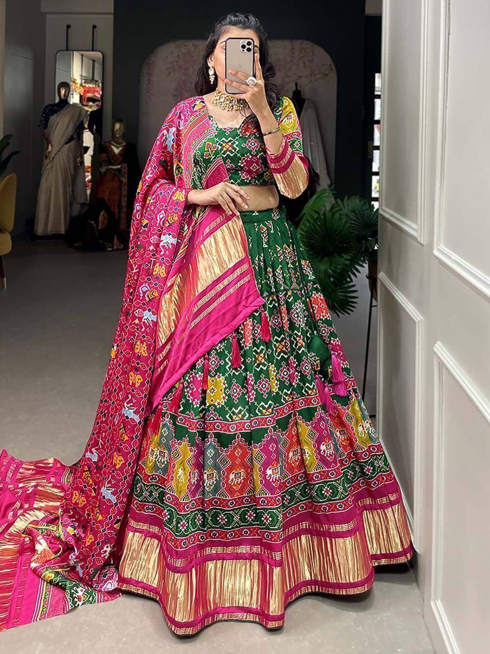 Vibrant green and pink printed lehenga choli with dupatta, perfect for Indian ethnic occasions