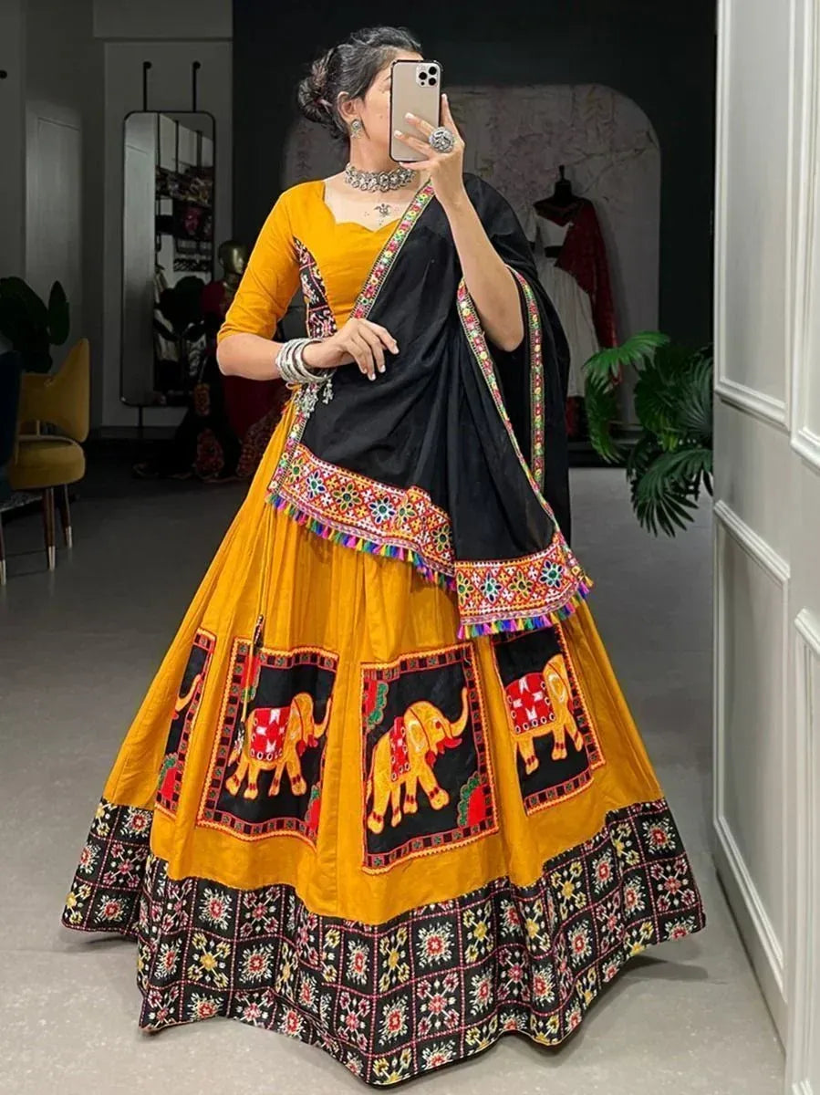 Yellow and black embroidered lehenga choli with elephant motifs, perfect for Indian ethnic occasions