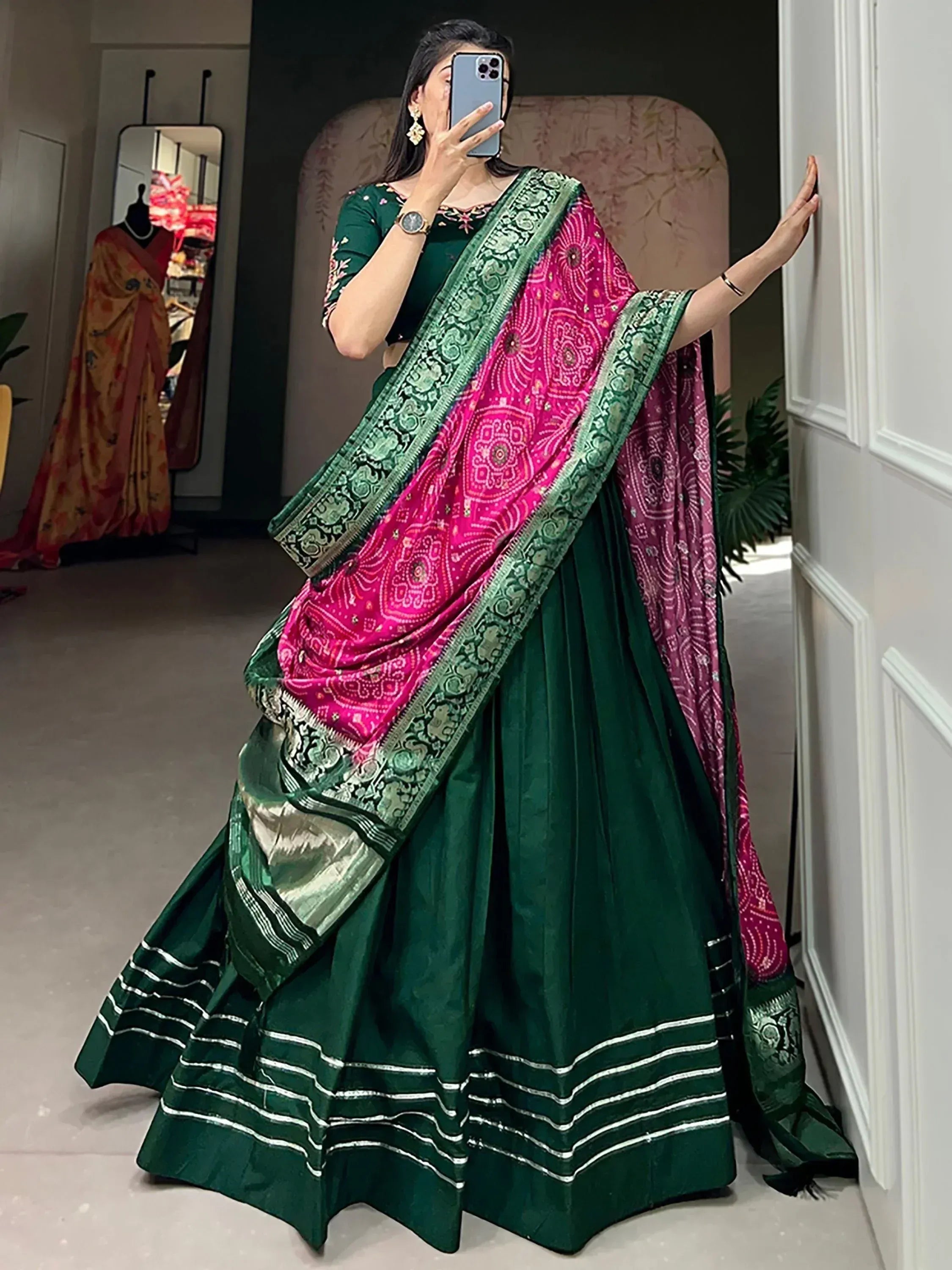 Emerald green lehenga choli with pink bandhani dupatta, ethnic Indian wear for women