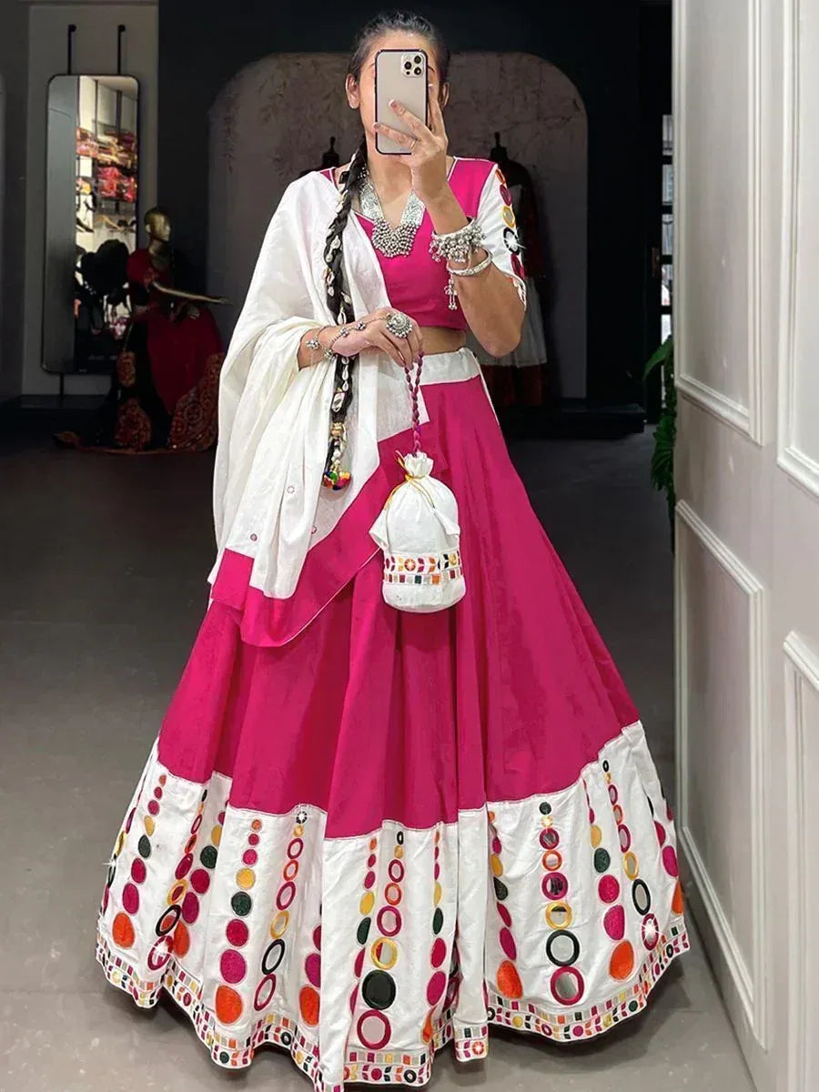 Pink and white embroidered lehenga choli with mirror work, perfect for Indian ethnic wear events