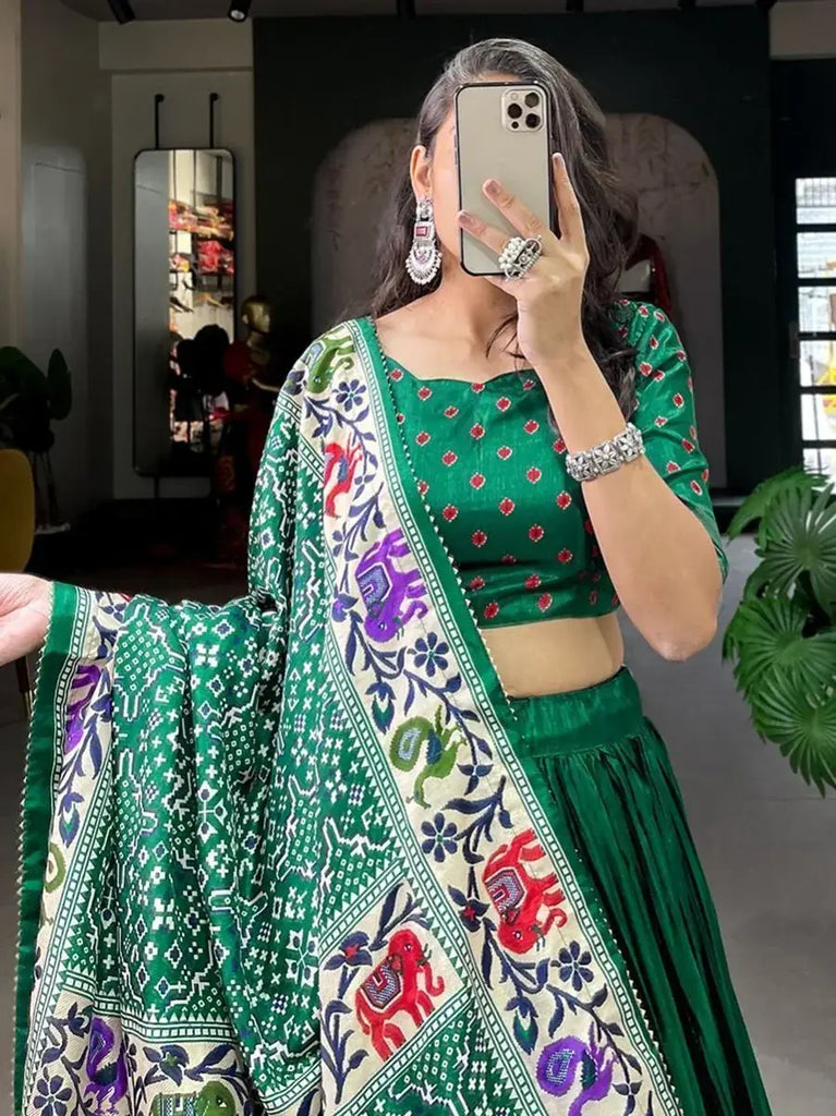 Enchanting Green Patola Print Dola Silk Wedding Wear Lehenga Choli