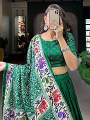 Enchanting Green Patola Print Dola Silk Wedding Wear Lehenga Choli