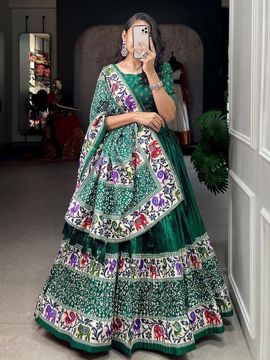 Green embroidered lehenga choli with elephant print, perfect for Indian ethnic wear and festive occasions.