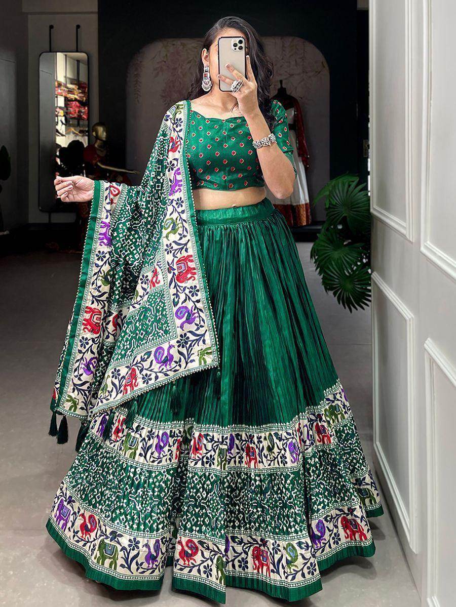 Enchanting Green Patola Print Dola Silk Wedding Wear Lehenga Choli
