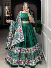 Enchanting Green Patola Print Dola Silk Wedding Wear Lehenga Choli