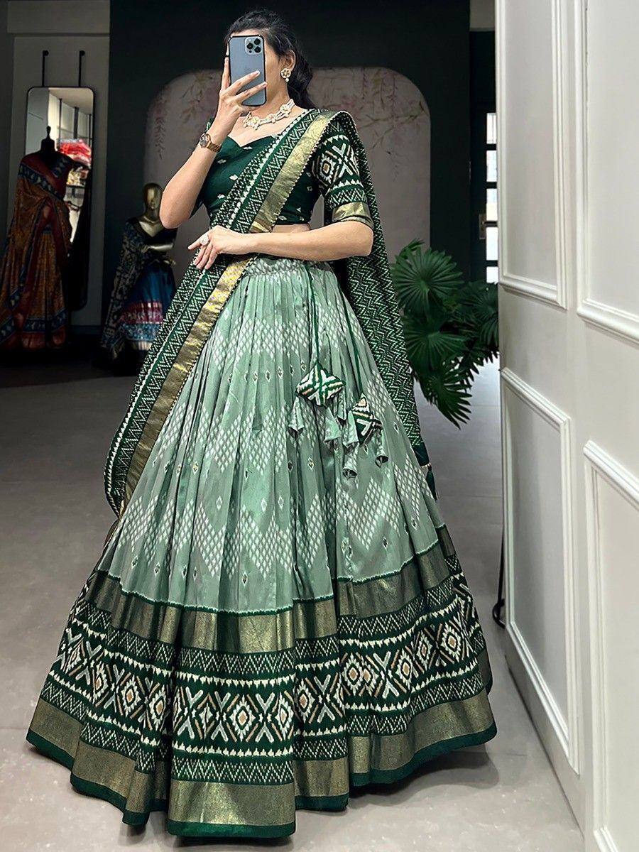 Green printed lehenga choli with geometric border, perfect for Indian ethnic occasions