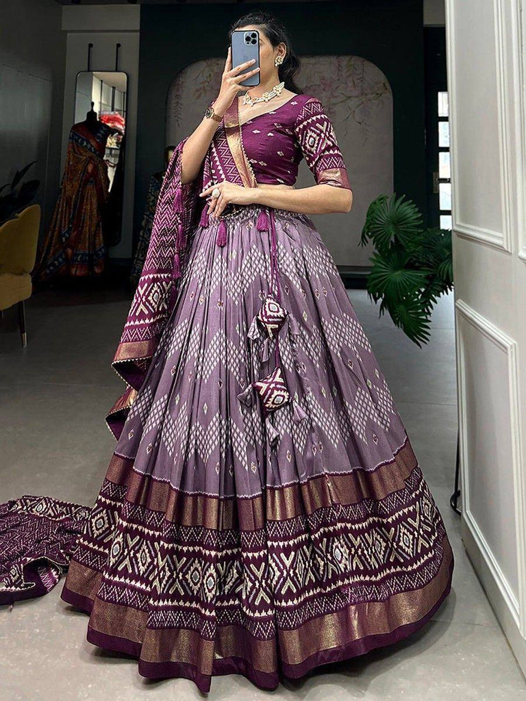Purple ethnic lehenga choli with geometric print, perfect for weddings and festivals