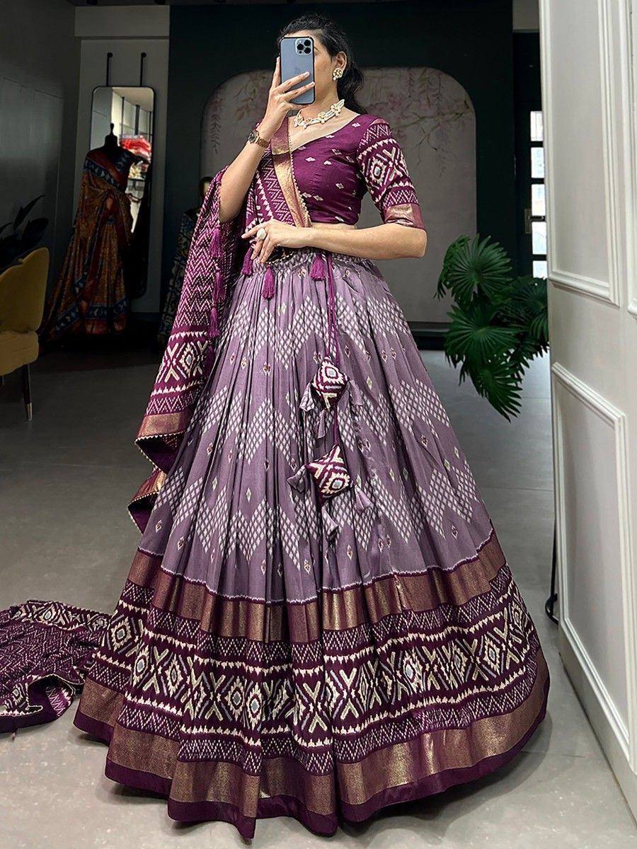 Purple ethnic lehenga choli with geometric print, perfect for weddings and festivals