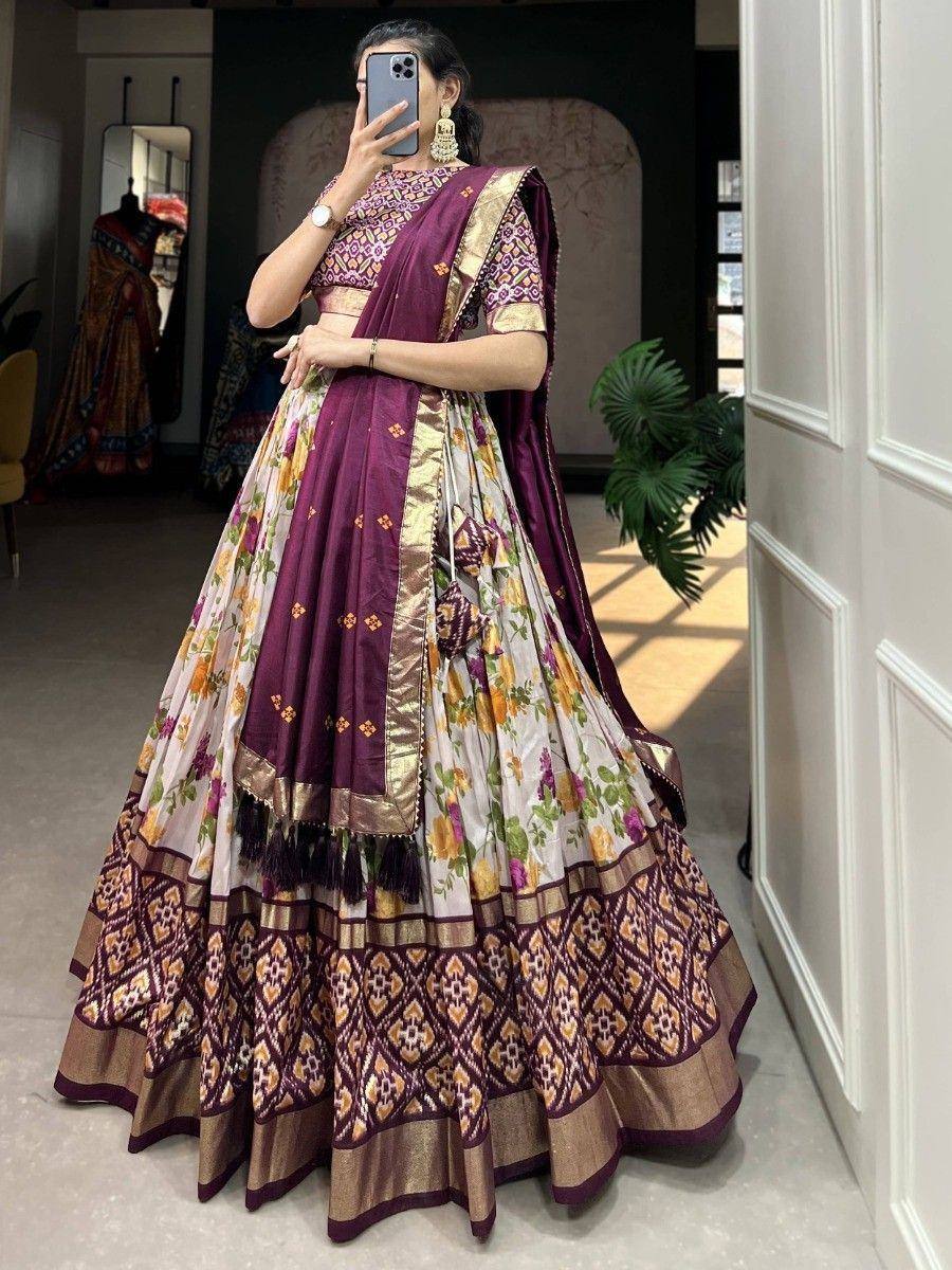 Purple and floral lehenga choli with gold border, perfect for Indian ethnic occasions