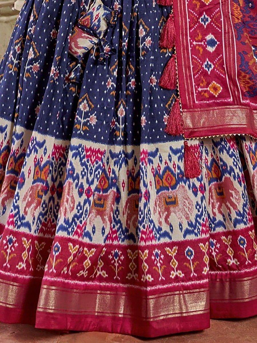 Blue and red ikat lehenga with elephant print and tassels, ethnic Indian wear