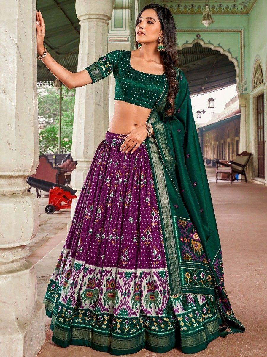 Green and purple printed lehenga choli with elephant motifs, perfect for Indian ethnic wear occasions