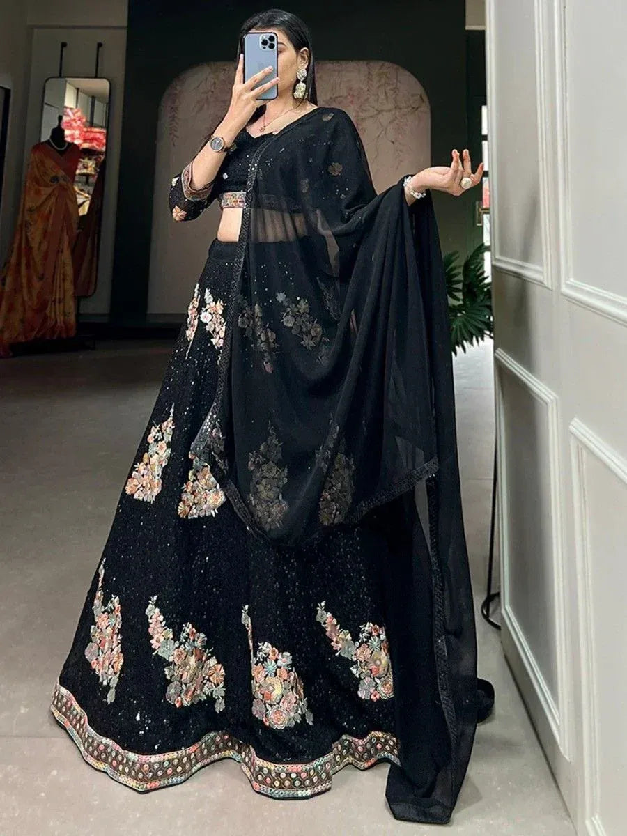 Black floral embroidered lehenga choli with sheer dupatta, perfect for Indian ethnic wear occasions
