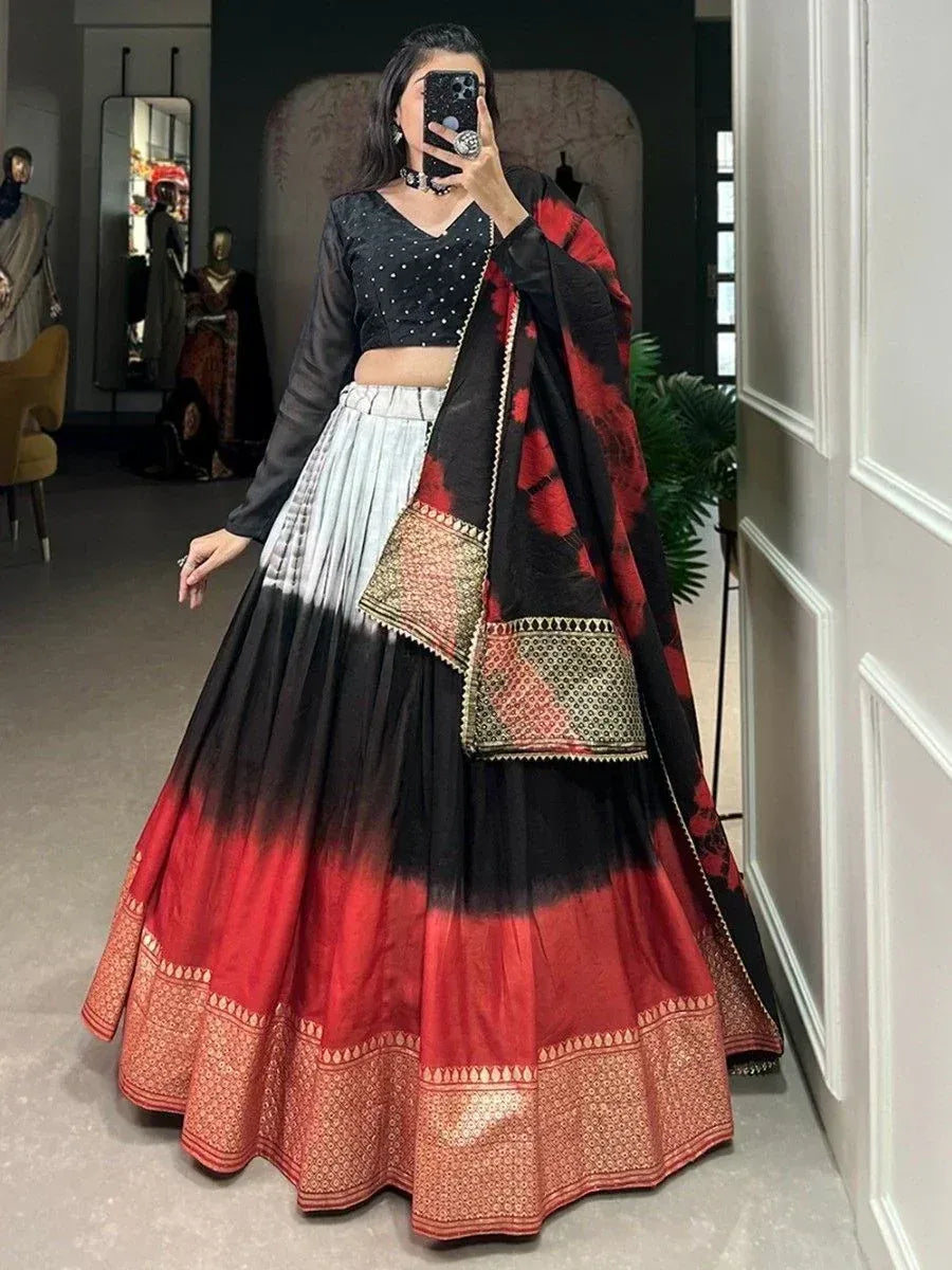 Black and red ombre lehenga choli with gold embroidery, perfect for Indian ethnic wear occasions