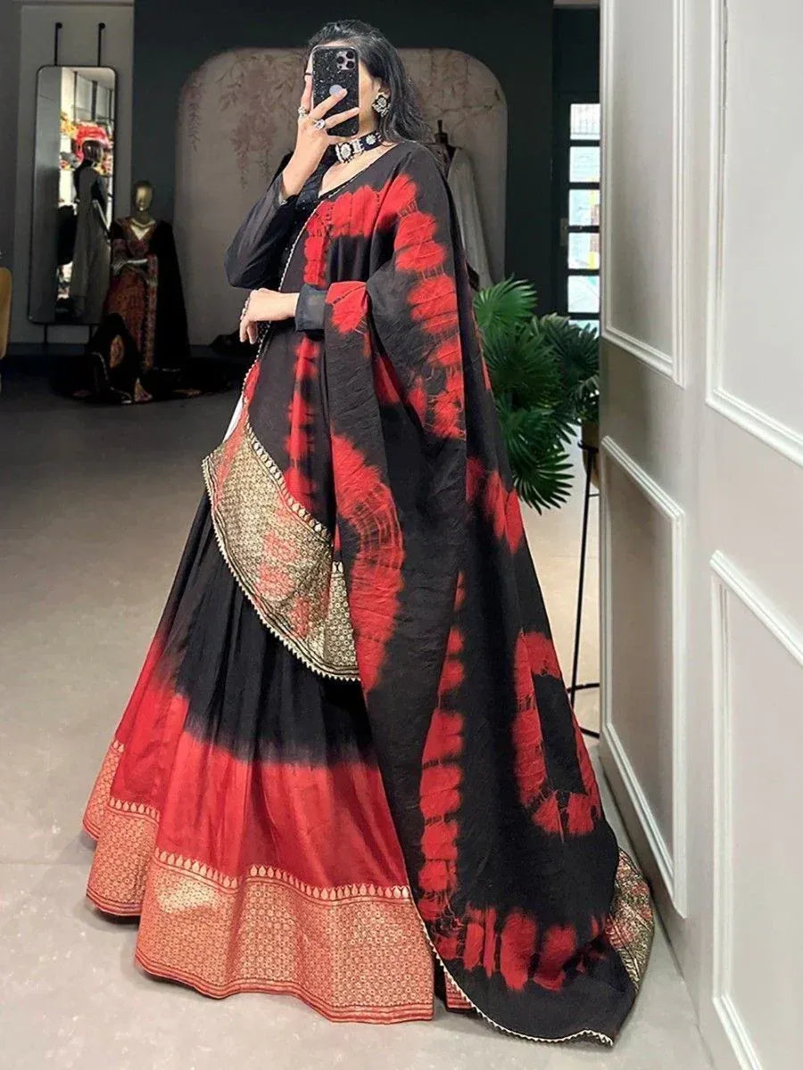 Black and red tie-dye lehenga choli with gold border, ethnic wear for women