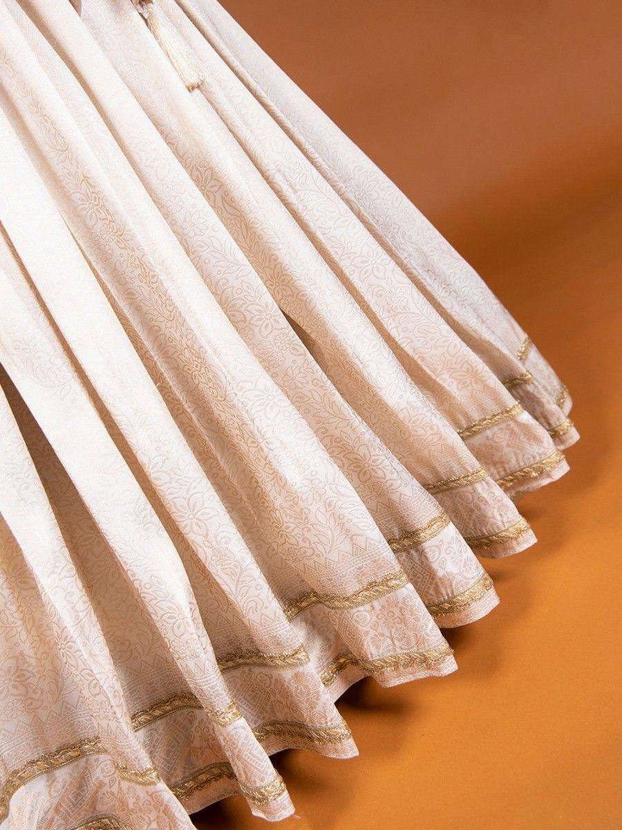 Cream embroidered lehenga skirt with gold trim, ethnic Indian wear