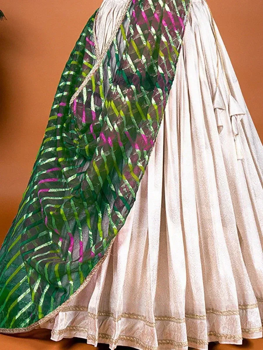 Cream pleated lehenga with green and pink patterned dupatta, ethnic wear for women