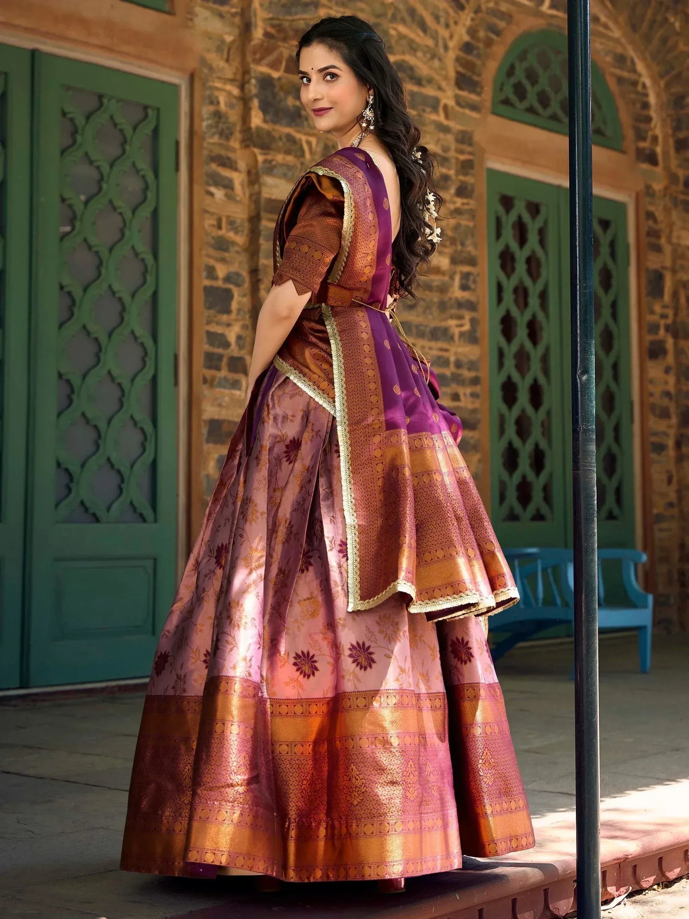 Purple and gold designer lehenga choli with floral motifs, perfect for Indian ethnic wear occasions