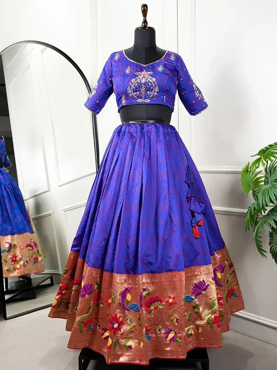 Royal blue embroidered lehenga choli with floral border, perfect for Indian ethnic occasions