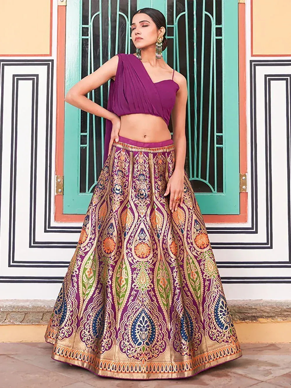 Purple designer lehenga choli with intricate multicolor embroidery, perfect for Indian ethnic wear occasions