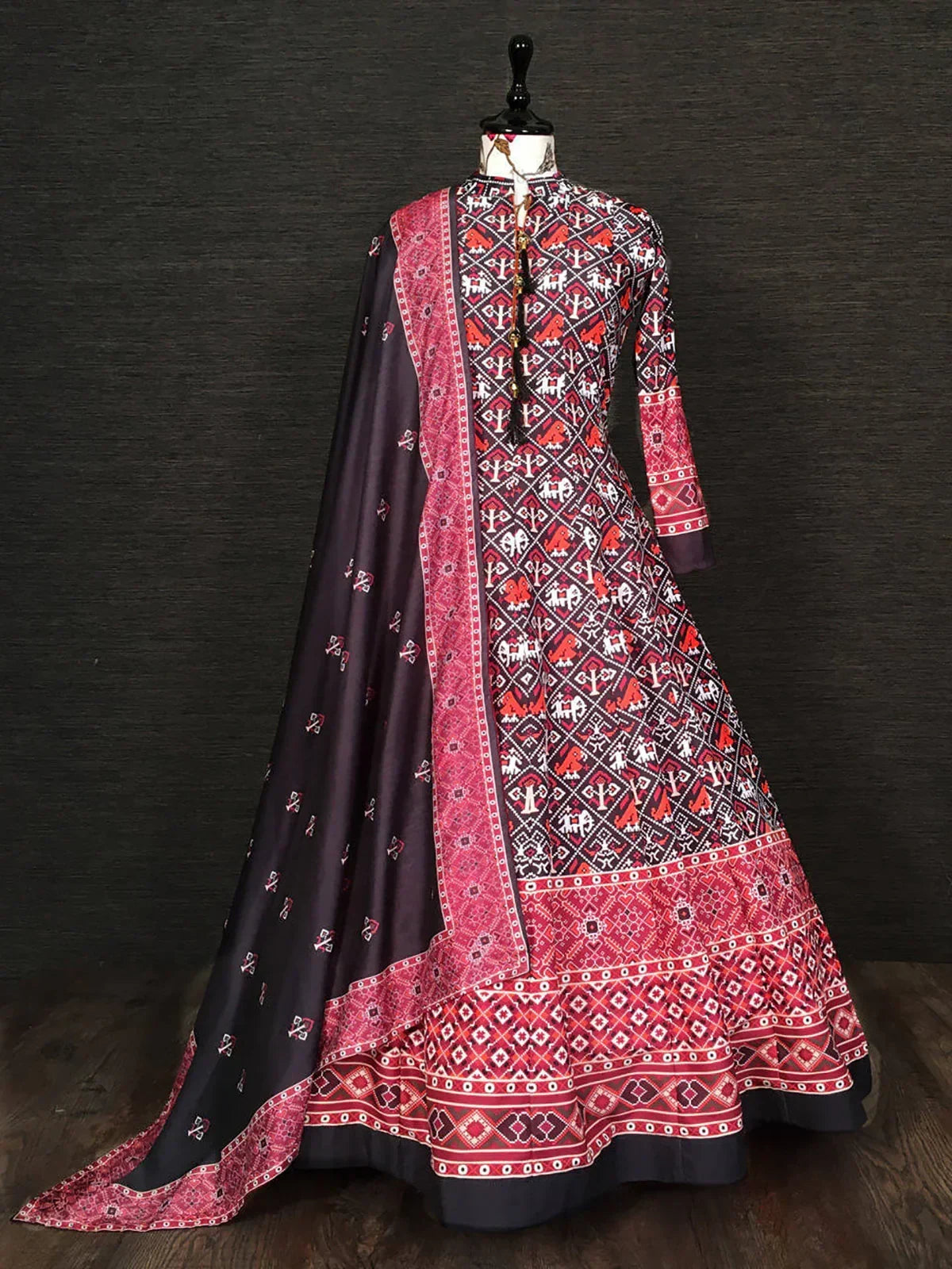 Black and red ethnic gown with traditional geometric patterns and matching dupatta