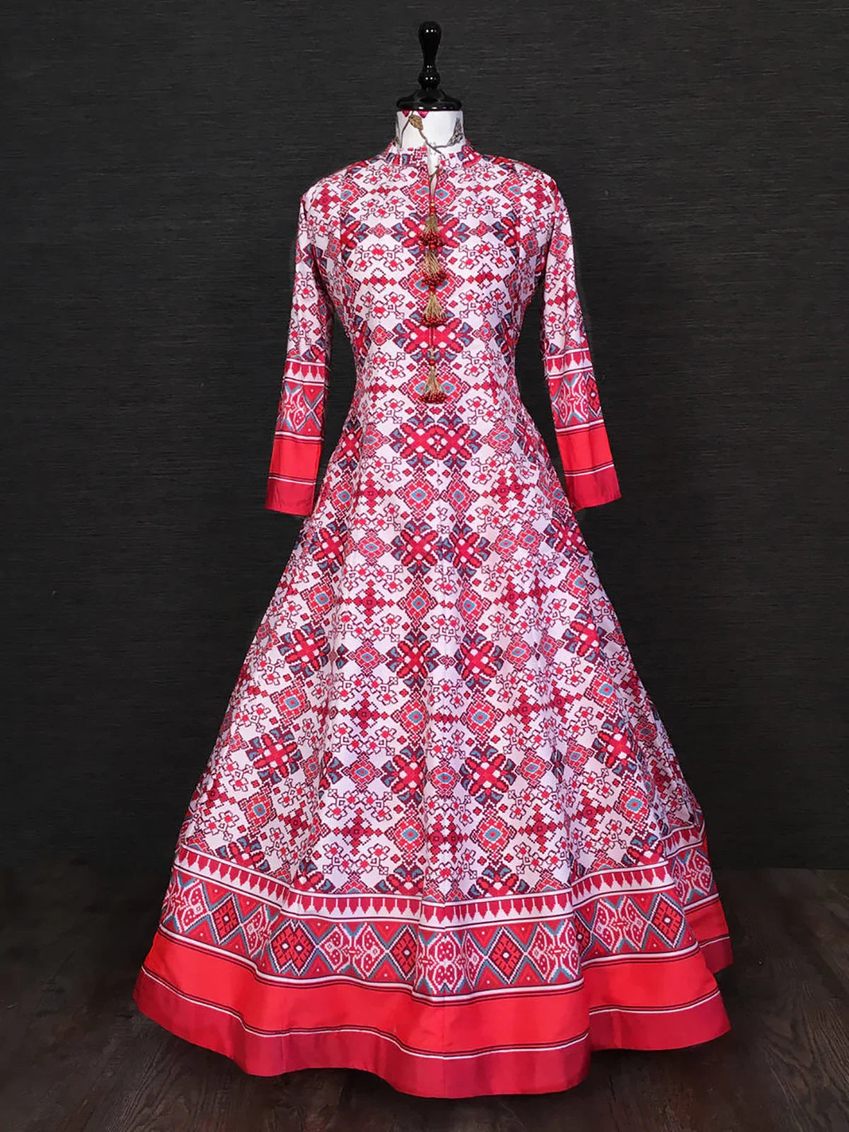 White and red embroidered long ethnic gown with full sleeves and geometric patterns